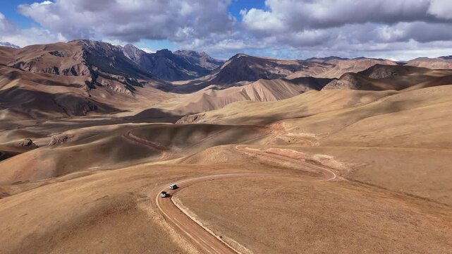 Off Road Vehicles Road Trip Kyrgyzstan Mountains aerial view