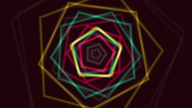 Abstract geometric pattern of overlapping colorful pentagons, blurred on a dark background