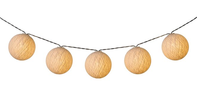 Golden hanging gourds on string line in soft natural light minimalist autumn decor