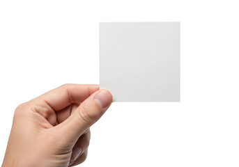 Fototapeta premium A hand holding a small plain white card or note