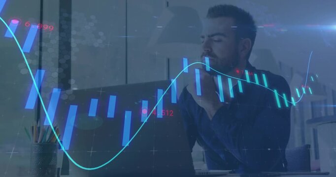 Monitoring man in dark blue shirt typing laptop, tapping smartphone at office with chart overlay