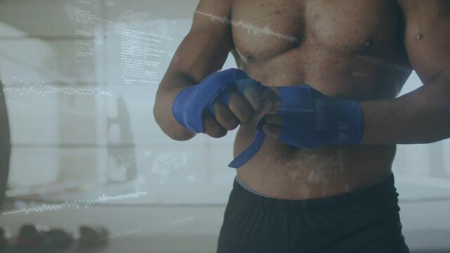 Male boxer wrapping blue hand wraps in boxing ring, animated guide tracing path for training prep