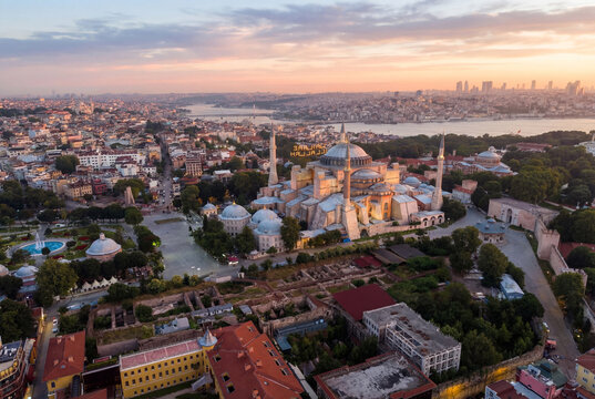 Aerial view of the Hagia Sophia mosque and the historic Sultanahmet district at sunset with the Bosphorus in the background Istanbul, Istanbul, Turkiye.