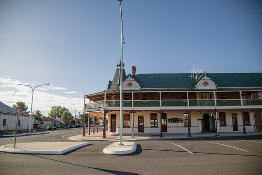 Historic Australian country hotel with a wide verandah on a sunny day