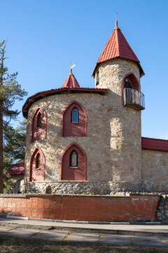One of the towers of the fabulous town of Andersengrad. Sosnovy Bor, Leningrad region (vertical)