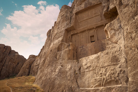 Ancient tomb carved in rock in Naqsh-e Rostam near Persepolis, Iran