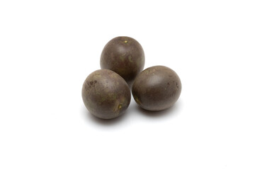 Fototapeta premium Three Whole Ripe Passion Fruits Isolated On White Background