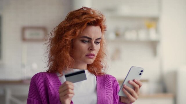 Puzzled Caucasian woman trying pay online at home mobile phone worried female buyer facing bank app error unsuccessful credit card transaction blocked money shopping using smartphone financial issue