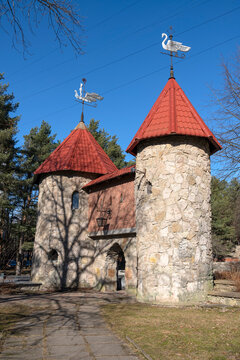 Gates of the fabulous town of Andersengrad. Sosnovy Bor, Russia (vertical)