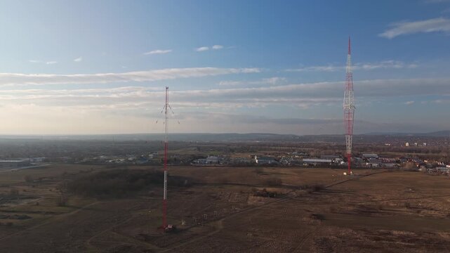 Lakihegy, Hungary&rsquo;s iconic Kossuth Tower, with its auxiliary broadcasting setup and side towers, stands amid the landscape near Budapest in this aerial drone view of the national broadcast landmark.