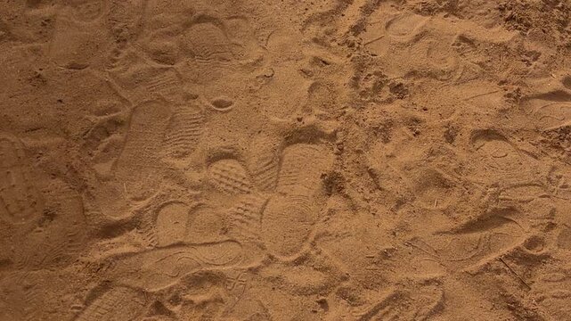 Footsteps Blend Into Sandy Shore. Marks Pressed Into Warm Sand Shape Coastal Scene Vividly