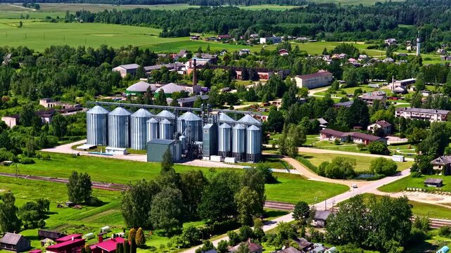 High angle view of agricultural silos complex under clear sky
