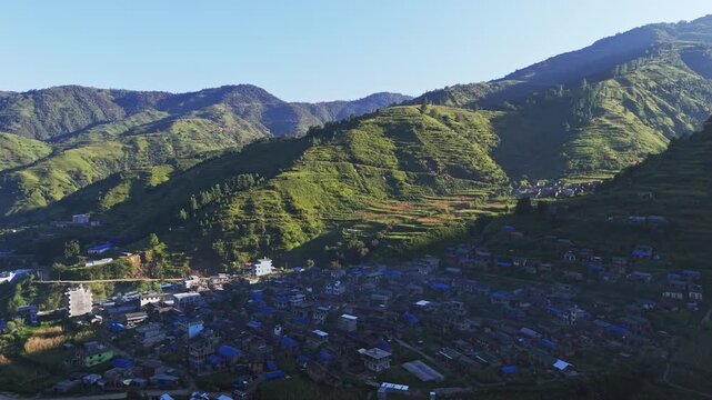 Thawang, Rolpa, Nepal known as a key site during the Maoist civil war and the location of a 2002 Royal Nepali Army massacre. Aerial footage shows the village landscape.