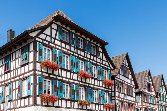 Historic half-timbered houses with flower boxes in Schiltach old town