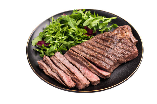 Barbecue dry aged wagyu entrecot steak on plate with salad isolated on white background