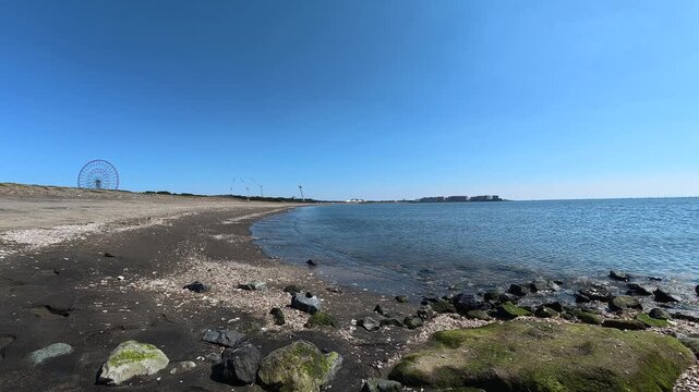 Rocky Shoreline and Blue Sea at Kasai Rinkai Park Tokyo Bay Japan