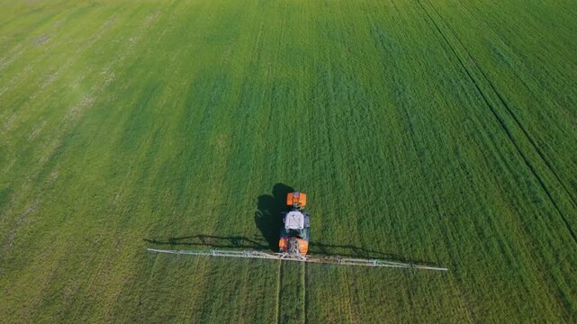 Aerial view from a drone of a tractor working the land in the Cinco Villas region of the province of Zaragoza, Aragon, Spain, Europe