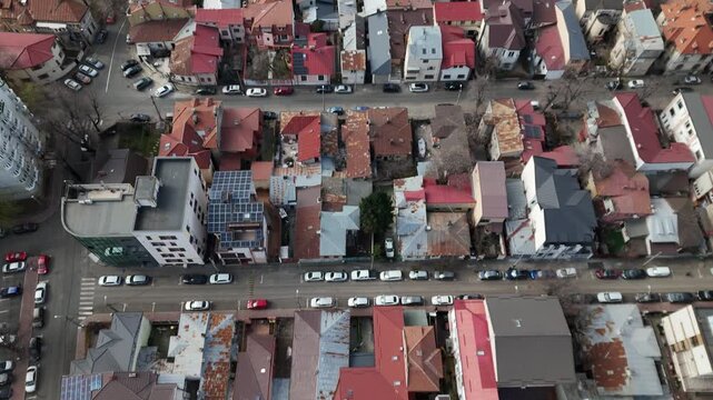 Aerial view of closely packed buildings with diverse architecture along Calea Dudesti, creating a textured urban landscape, Bucuresti, Bucuresti, Romania.