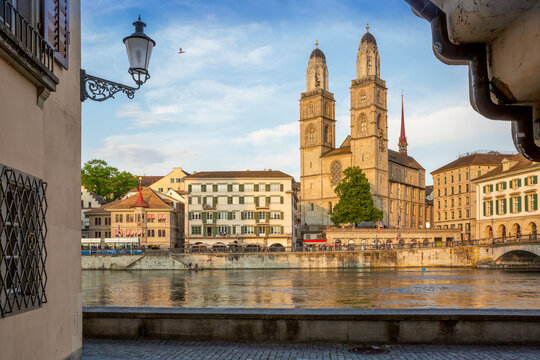Grossm�nster cathedral and river Limmat in Zurich at sunset in summer