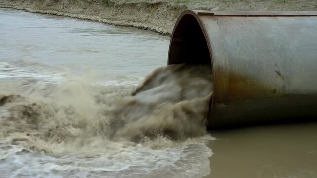 Pollution Harms Ecosystem. River Contamination Caused By Leaking Industrial Pipes Disrupts Nature Balance