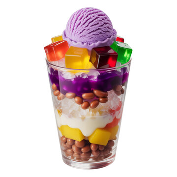 A colorful filipino dessert called halohalo in a glass cup with purple ice cream on top