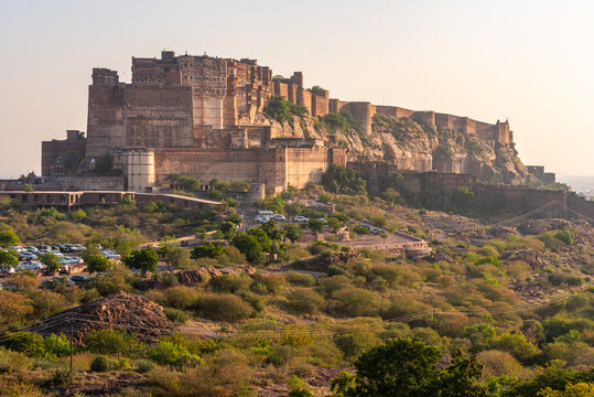 Mehrangarh Fort at the golden hour with the adjacent rocky landscape, Jodhpur, Rajasthan, India