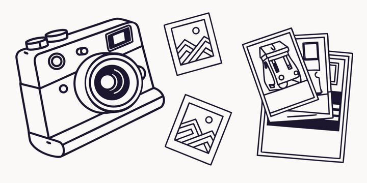Camera with photographs and polaroids on white background