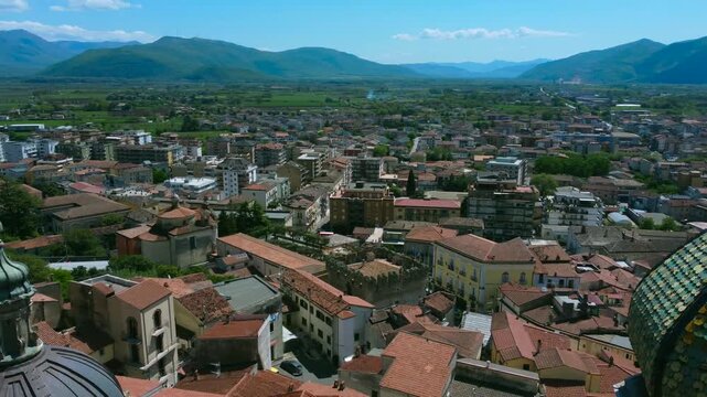 Town of Venafro, Molise - Drone view, turnaround reveals Annunziata Church (close-up of the bell tower) and Pandone Castle