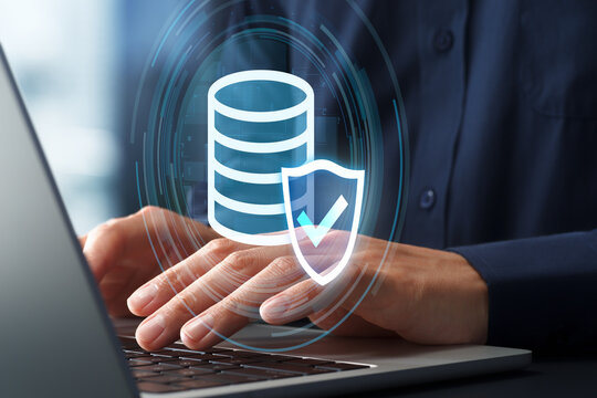 Secure database and information security solutions. Network storage and data protection. Businessman using laptop computer. Shield and check mark icon.