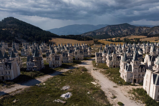 View of the abandoned Burj Al Babas castle-like villas nestled in a valley with mountains and a cloudy sky Dolayuz, Bolu, Turkiye.
