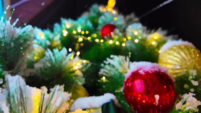 Snow covered Christmas tree view from bottom to top. Snowy winter streets