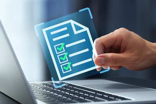 Document management system for automatically sending and receiving approved files. Businessman using laptop computer to securely store legal documents.