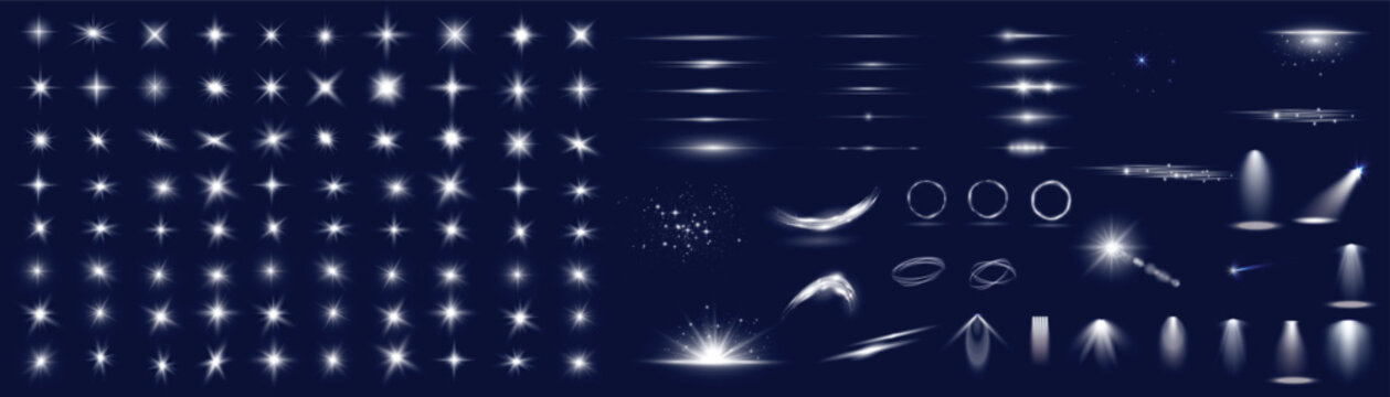 Collection of bright white lens flares and light effects on dark background