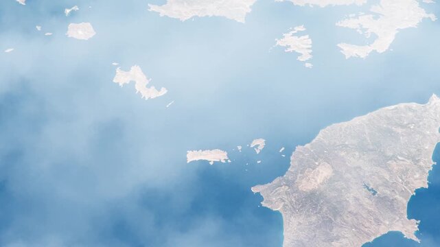 Flying over Rhodes and Aegean Sea Greek islands satellite view from space with passing clouds based on Nasa imagery