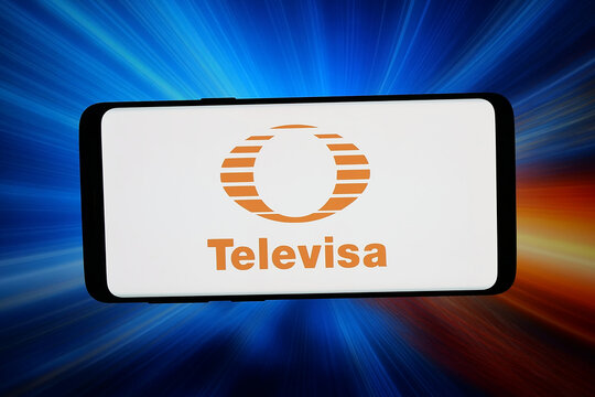 Stuttgart, Germany - 03-20-2026: In this photo illustration, the logo of telecommunications company Grupo Televisa is displayed on a smartphone in front of abstract background on computer screen.