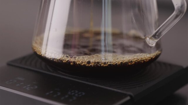 Bubbles and aeration in glass server filled with fresh coffee