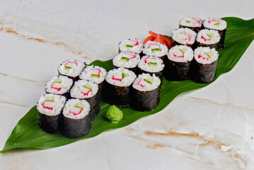 Maki sushi on a leaf © carinne