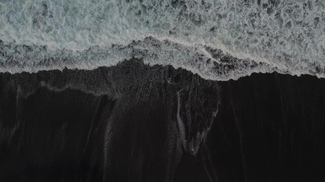 Top shot of beach with black sands