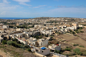 Obraz premium Panoramic view of a traditional village in the island of Gozo, Malta.