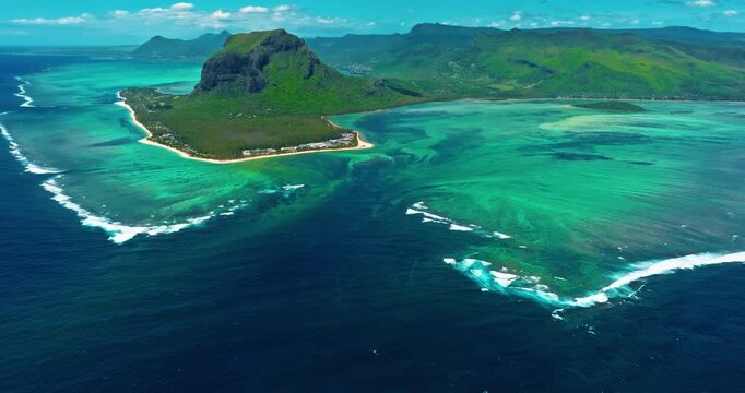 Aerial view of Underwater waterfall in a coral reef with turquoise water. Island Mauritius in the Indian Ocean