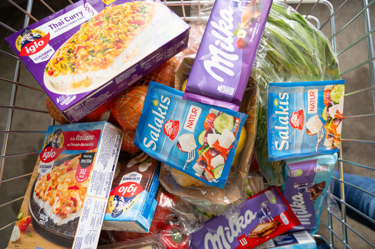 Feta cheese, Iglo fish, vegetables and milka chocolate, shopping cart with food, buying grocery, supermarket, inflation, Trier, Germany