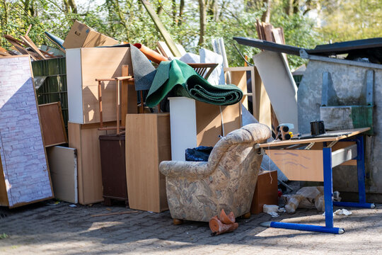 bulky waste reduction, large pile discarded furniture and wooden panels, renovation or decluttering process, used things on street, problem shredding garbage, diverted for recycling, pollution nature