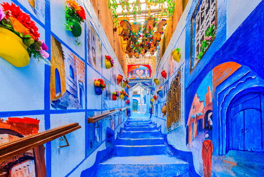 Chefchaouen, Morocco. Blue medina, ancient city, colourful flowerpots.