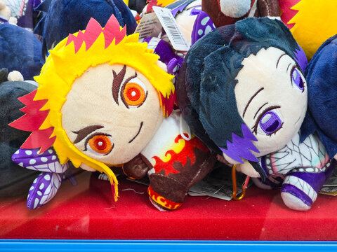 Taiwan, Taipei City, January 3, 2026 &ndash; Demon Slayer Anime Plush Toys Zenitsu and Nezuko Inside Arcade Claw Machine