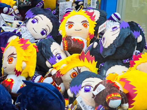 Taiwan, Taipei City, January 3, 2026 &ndash; Demon Slayer Anime Plush Toys Zenitsu and Nezuko Inside Arcade Claw Machine