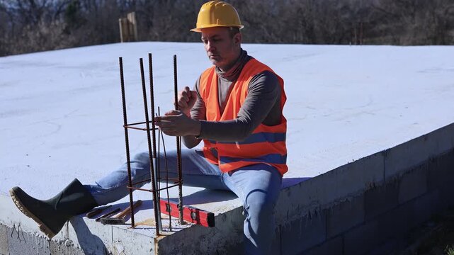 Construction worker working outdoors on a construction site.