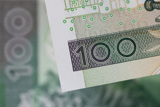 Two banknotes of the Polish zloty, each with a face value of 100