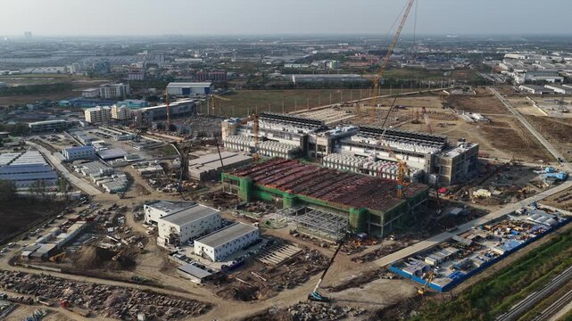 Aerial drone view of a data center under construction in Chonburi, Thailand, showcasing hyperscale AI infrastructure, cloud computing systems, and large scale IT technology development.