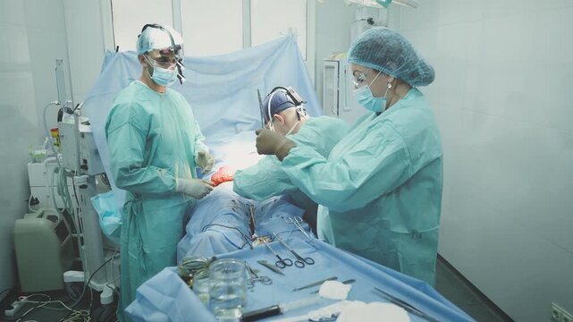 Three doctors in medical uniform perform operation neurosurgery treatment surgeons professional men working with nurse woman preparing bandage practitioners medicine surgery work health life insurance