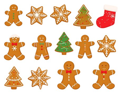 Varied ginger cookies gingerbread men, stars, trees, stocking arranged on a white surface